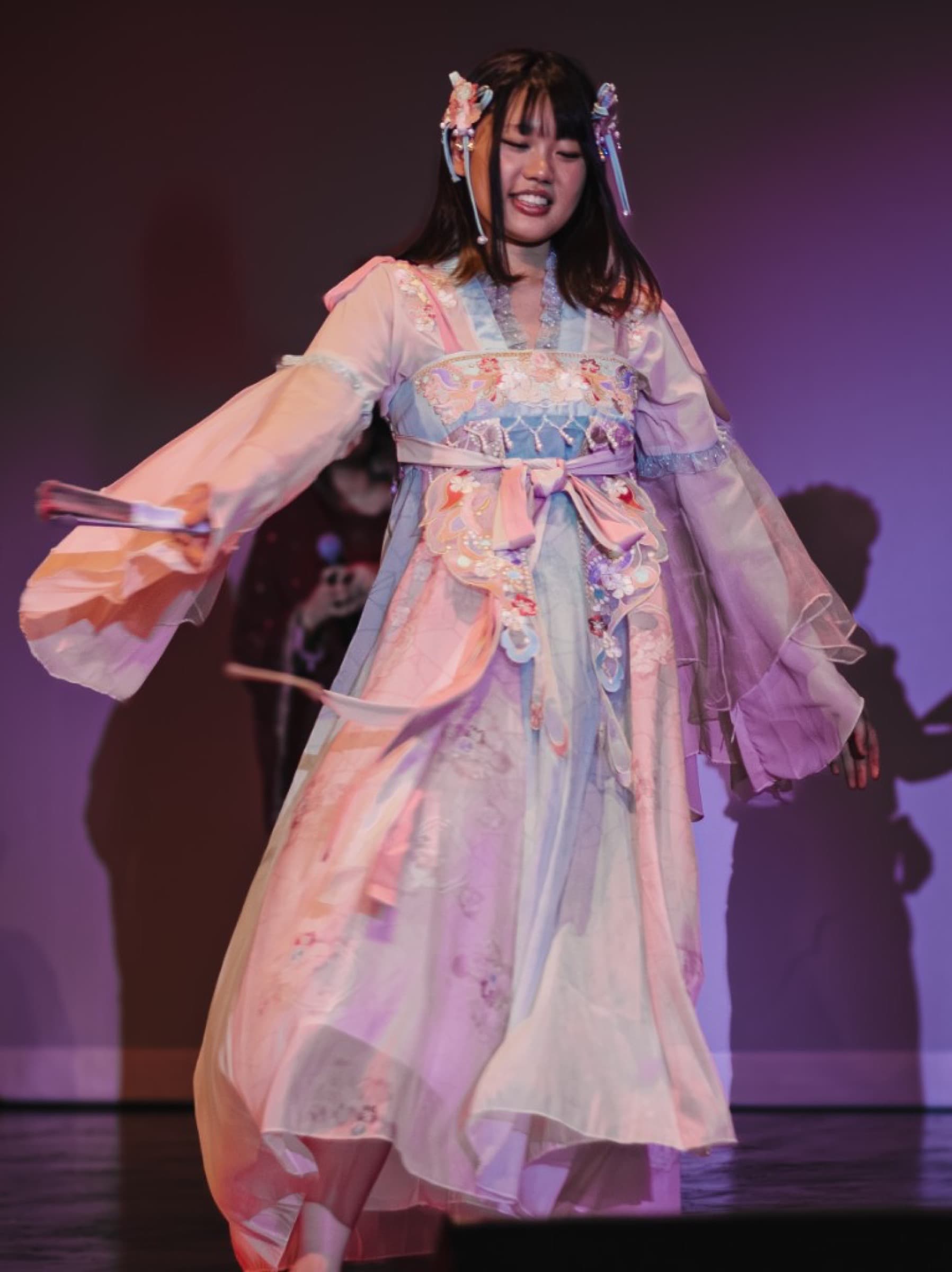 Student performer on stage