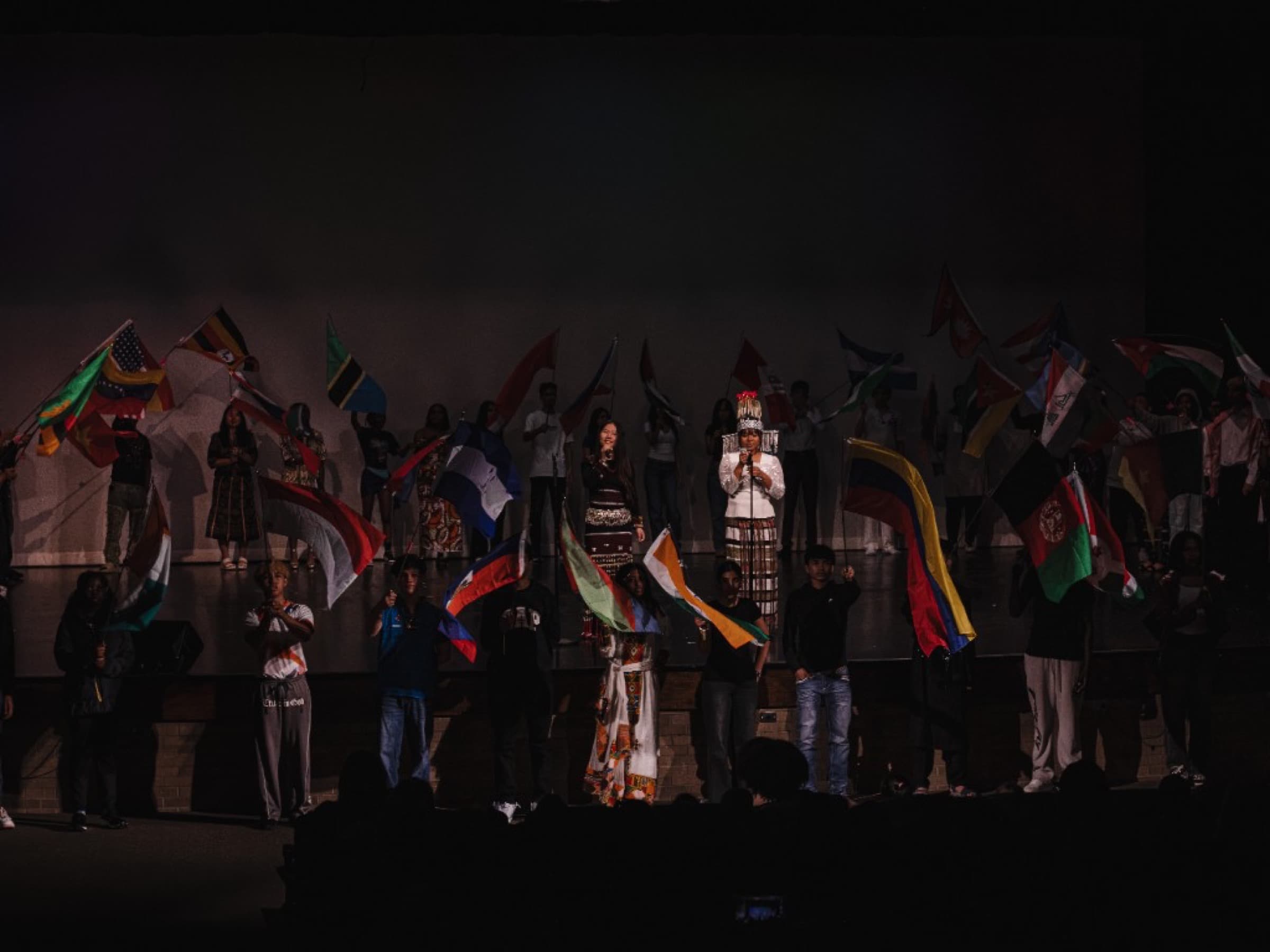 Student performers on stage
