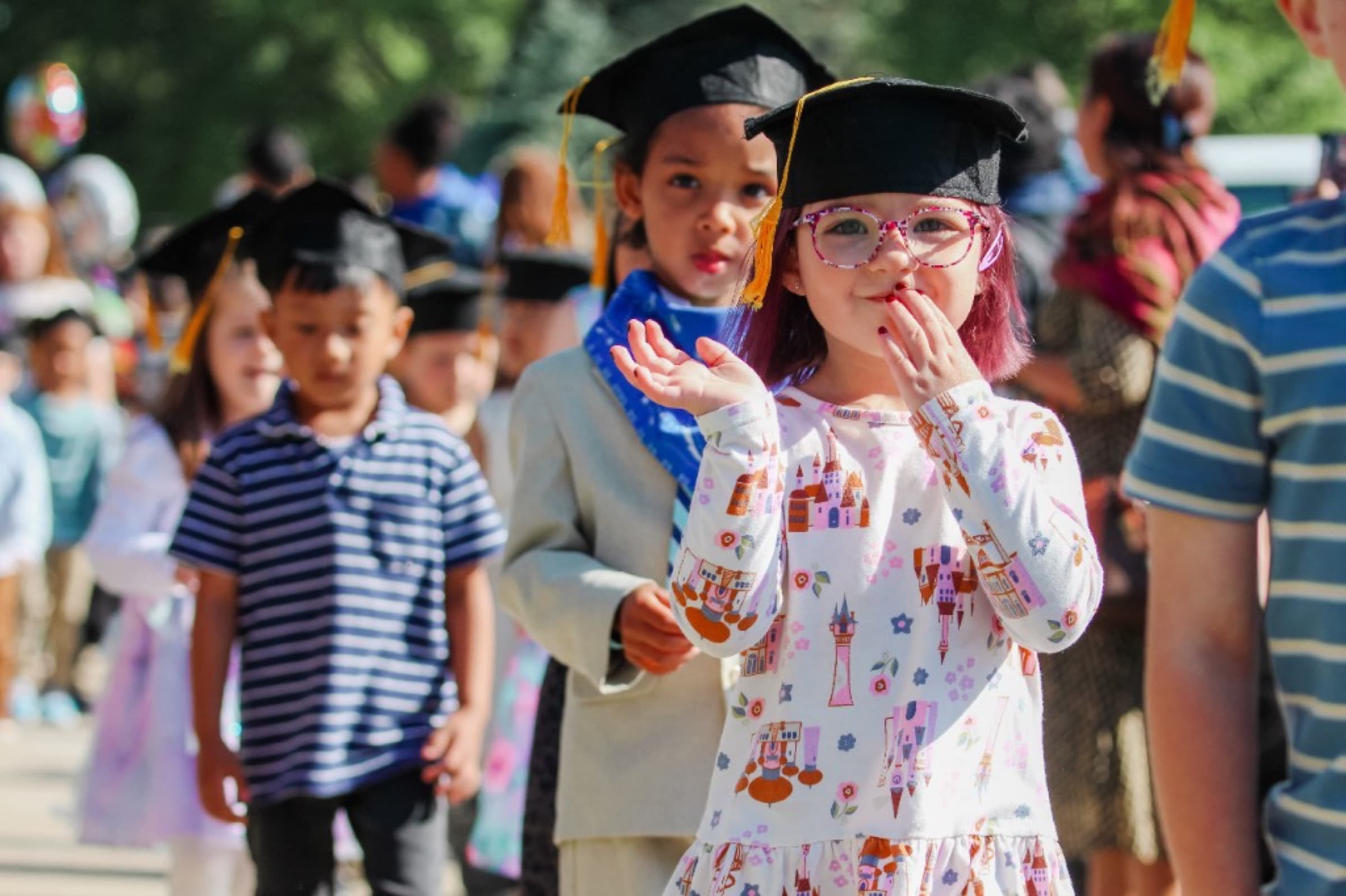 Children at a preschool graduation