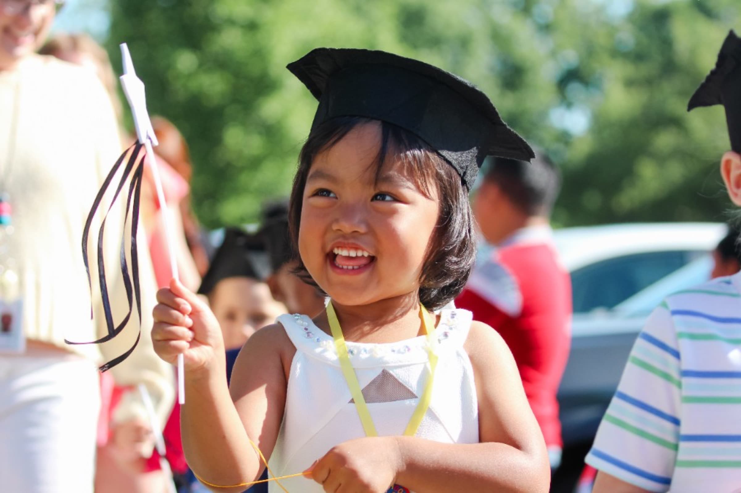Child in a graduation cap