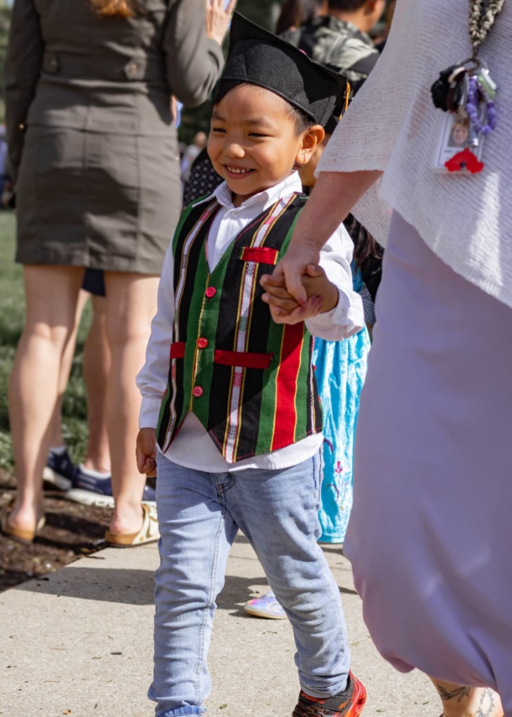Child in a graduation cap
