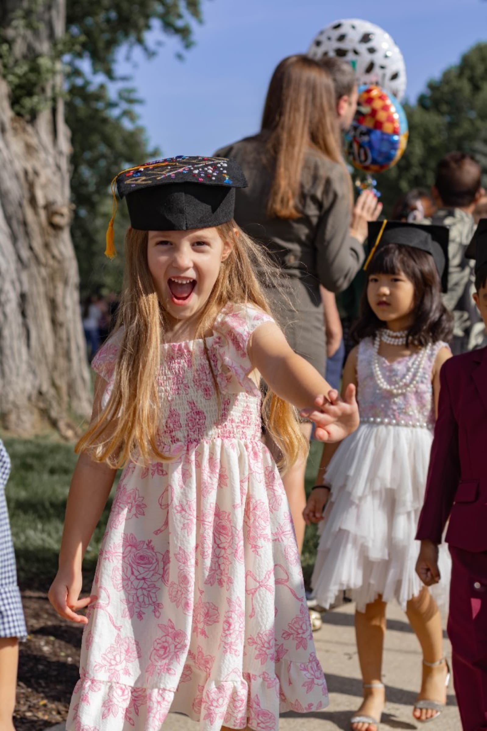 Children at a preschool graduation
