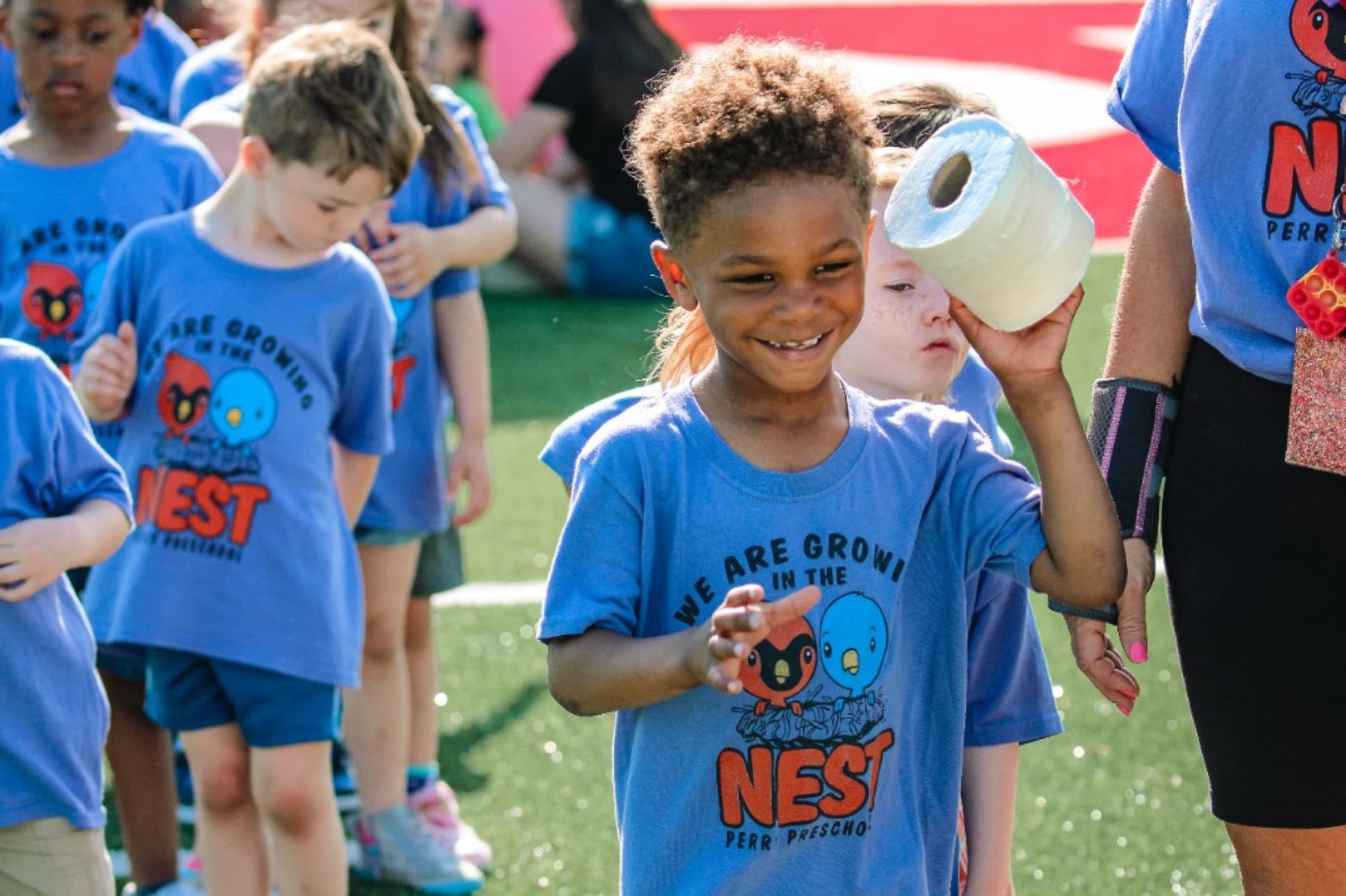 Preschool students in colorful shirts