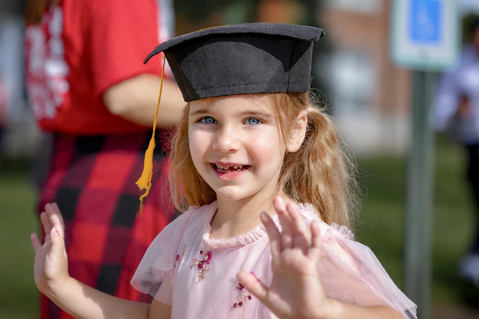Child in a graduation cap