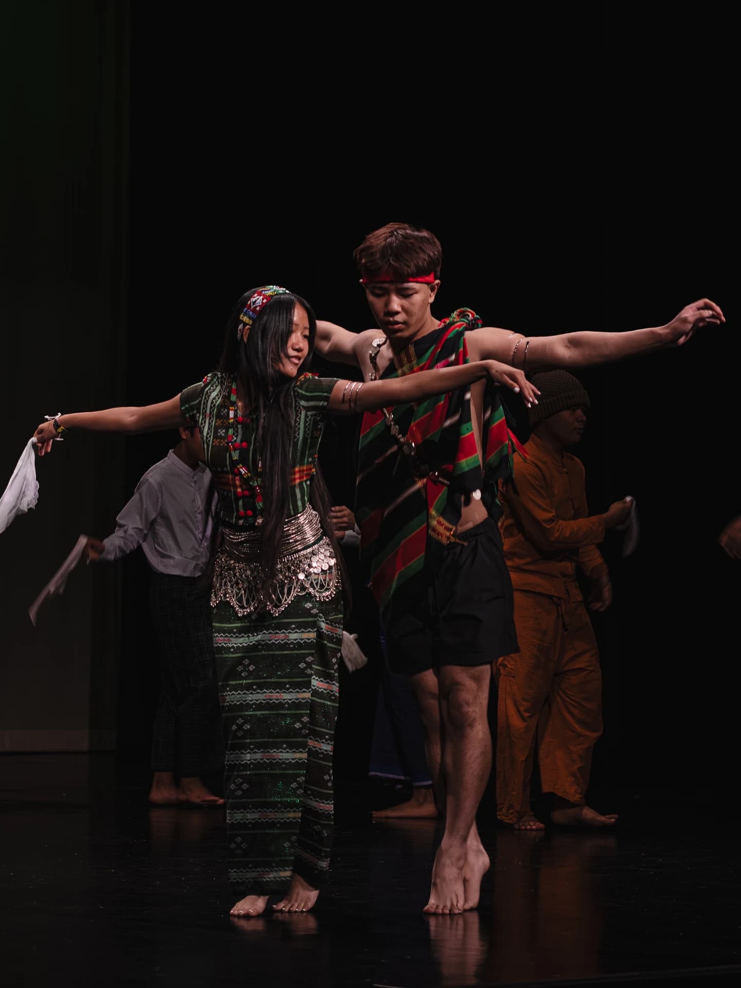 Student performers dancing on stage
